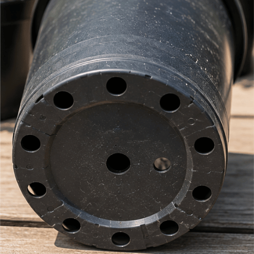 Drainage holes in container